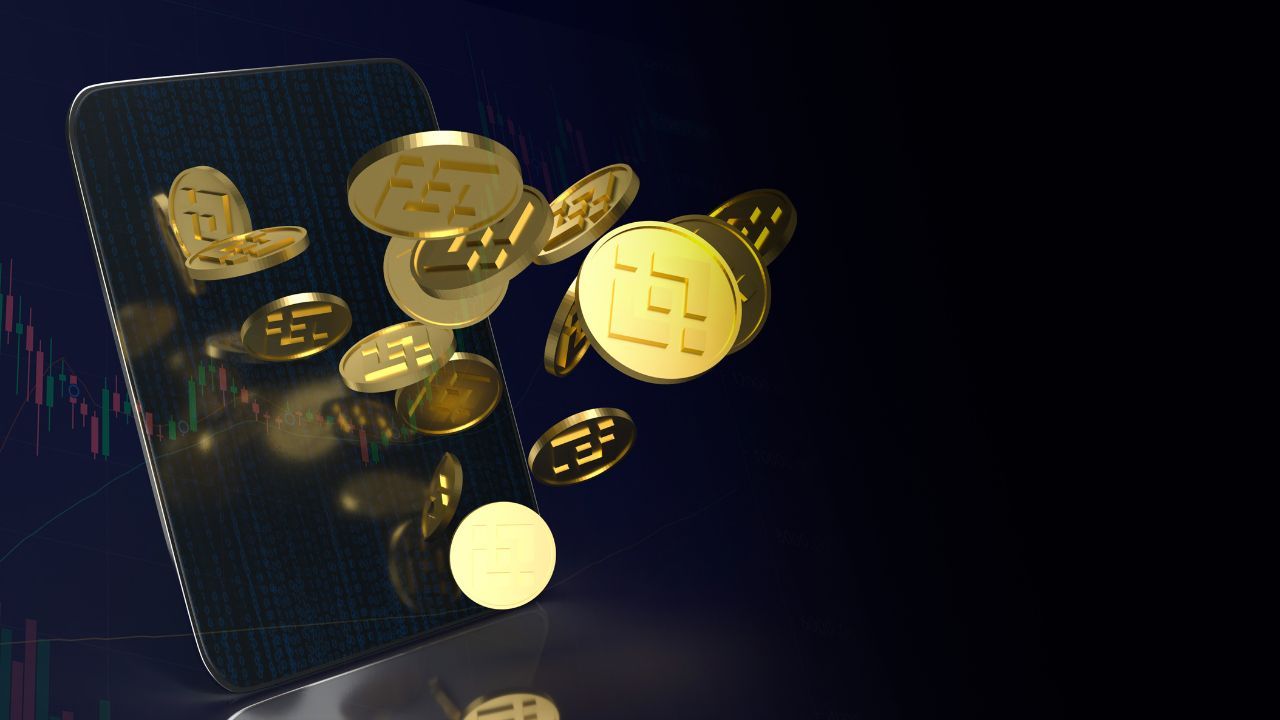 3D illustration of golden cryptocurrency coins falling out of a smartphone with digital charts in the background