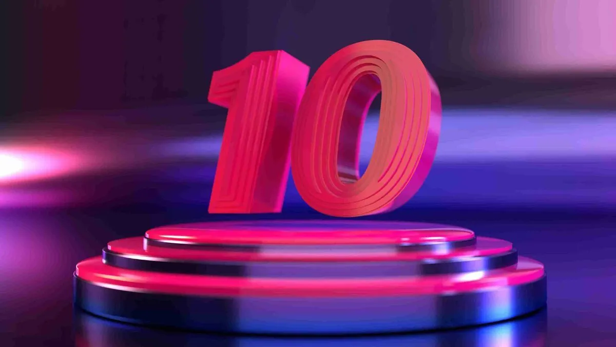 A pink-colored visual of the number ten paired with a miniature stage