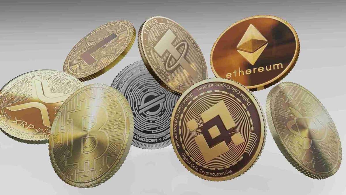 A set of eight gold infused crypto tokens including Bitcoin Ethereum USDT Ripple Litecoin and more