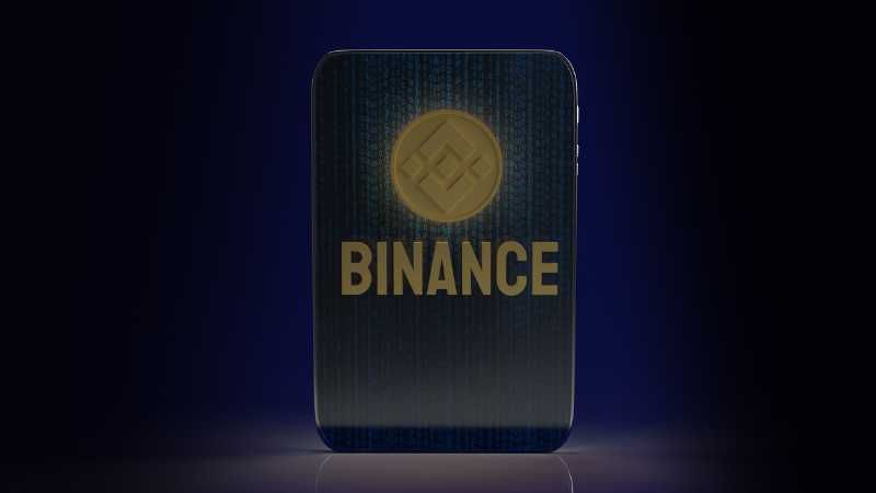 Binance branded card with a chip and logo on a blue gradient background