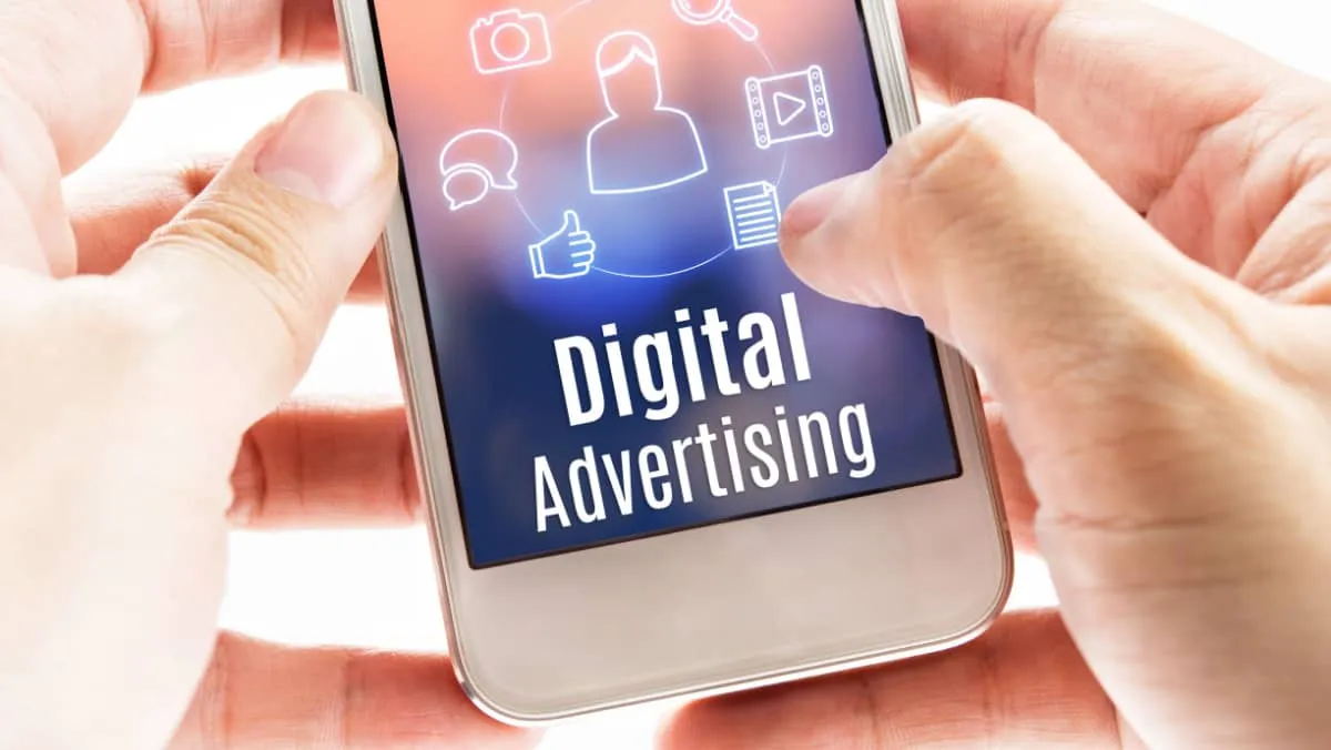 Close-up hand-holding mobile with Digital Advertising and icons, Digital Marketing concept