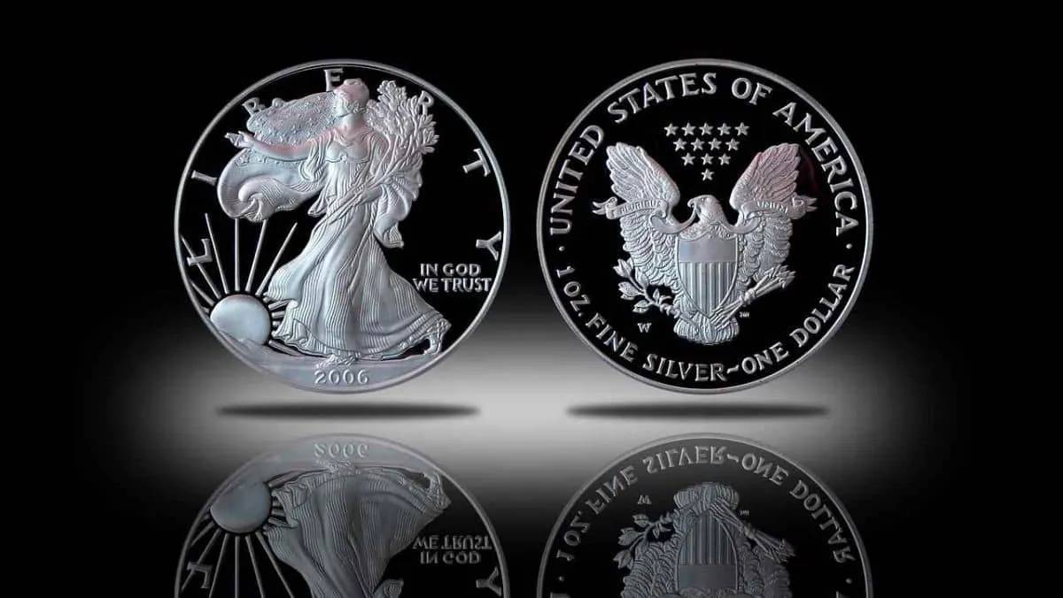 Obverse and reverse view of a minted proof of a silver one dollar coin