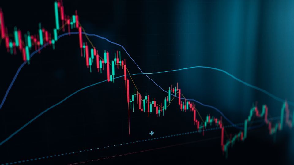 Stock market or cryptocurrency chart showing a downward trend, symbolizing a decrease in value