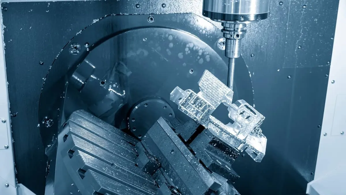 The 5-axis machining center cutting aerospace parts with solid ball end mill tool. The hi-precision automotive manufacturing process by multi-axis CNC milling machine.