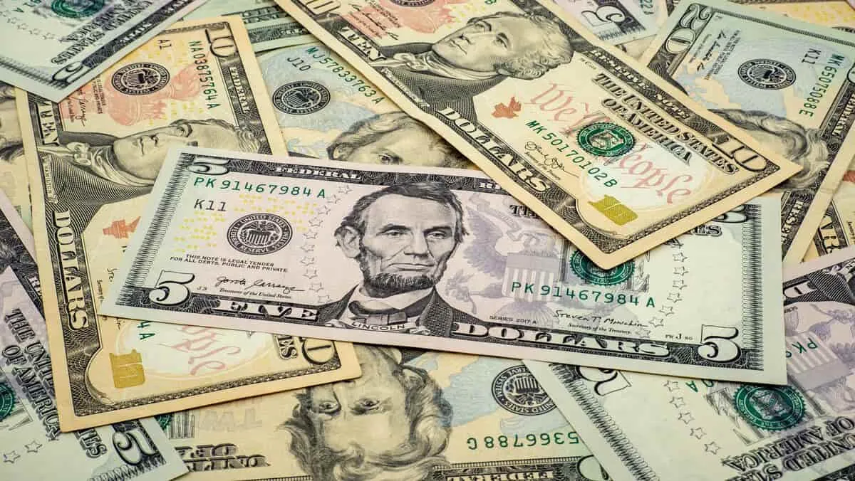 background-us-dollars-on-top-of-each-other-ideal-width-1200-format-JPEG.jpg