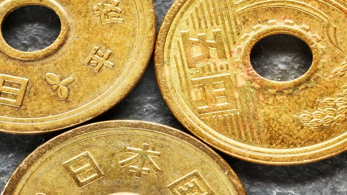 extreme-close-up-picture-of-japanese-yen-coins-2023-11-27-04-58-43-utc (1).jpg