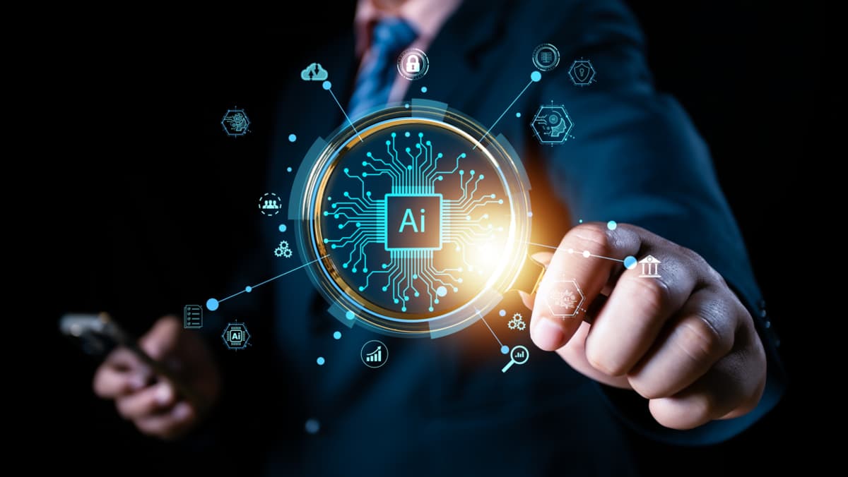 hand holding a magnifier with ai written on it